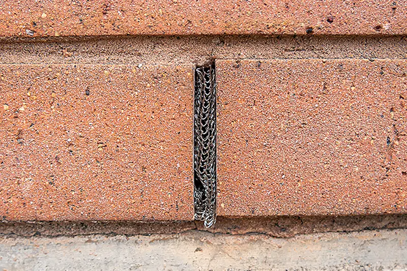 Weep hole gap space in-between the bricks of a brick wall, perfect for Vermont Pest Controls Flexi Armour protection.